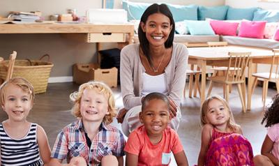 educator in an early learning program with children